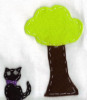 Cat_under_the_tree.jpg